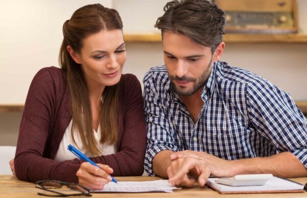 woman and man working on credit