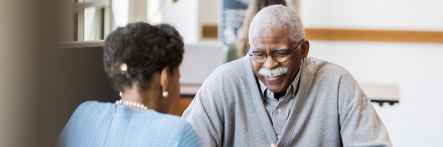 Senior citizen getting financial advice