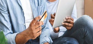 two people discuss credit card bills